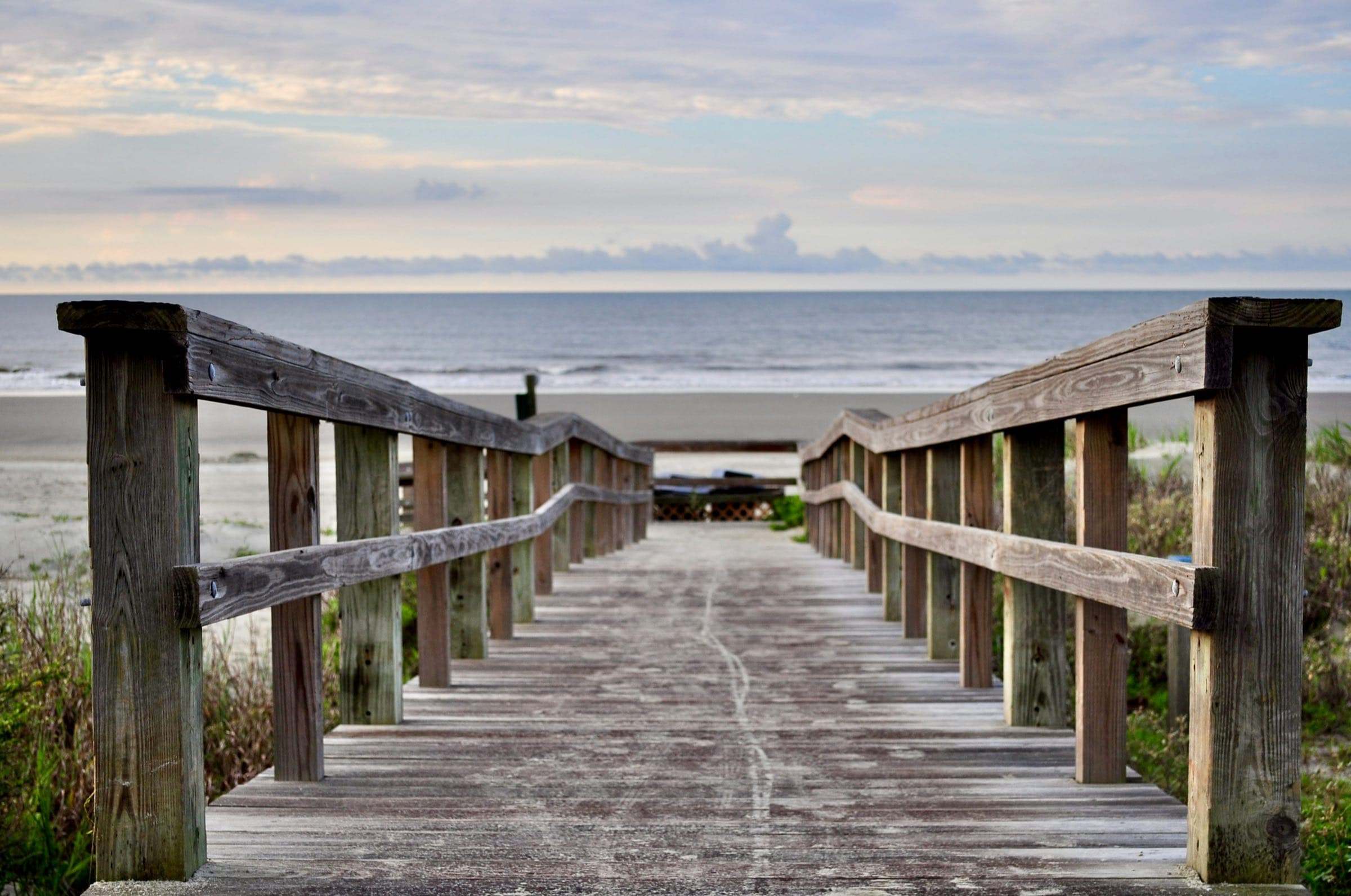 Weathered wooden walkover crossing the dunes to the beach on Kiawah Island