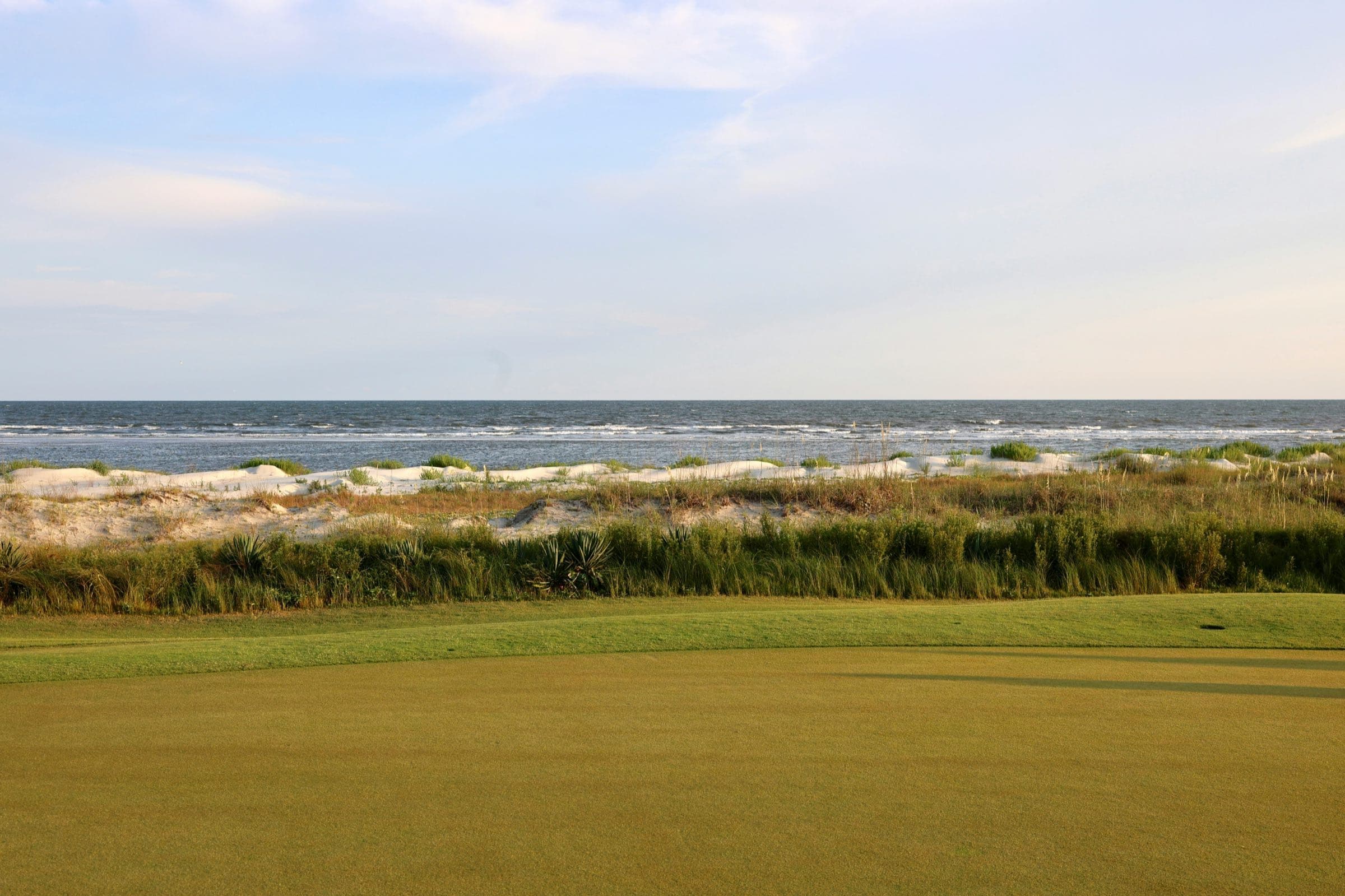 Golf green running out to dune grass and the Atlantic on Kiawah Island
