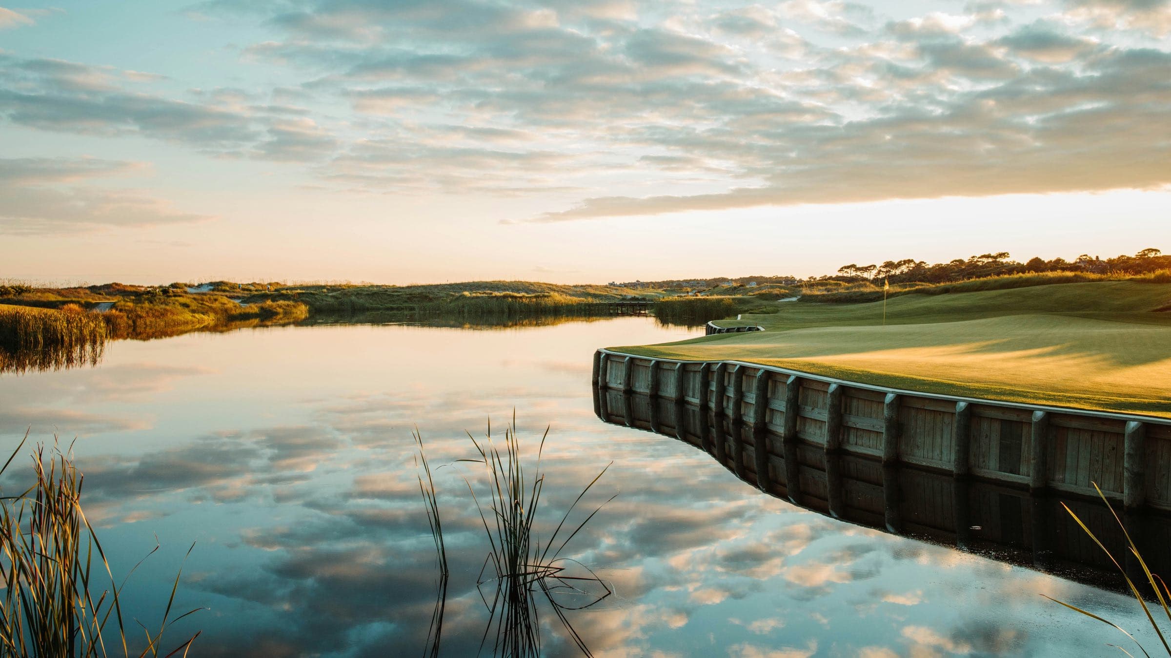Lagoon and wooden bulkhead beside the par-3 17th hole of the Ocean Course, Kiawah Island